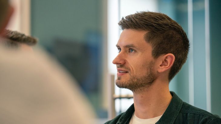 Jonny looking at his screen