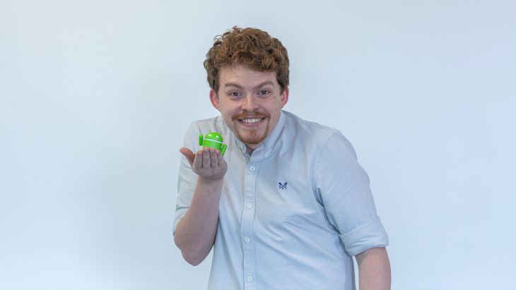 Alistair holding Android character