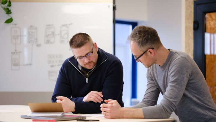 Josh and James working together on an R&D Project at the standing desk