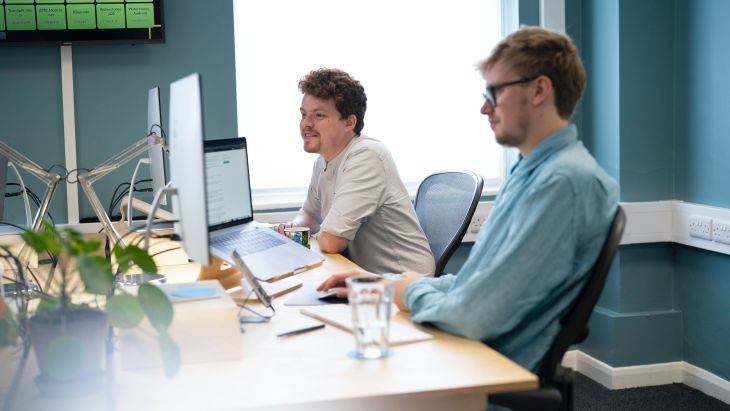 Alistair and Rhys working alongside each other